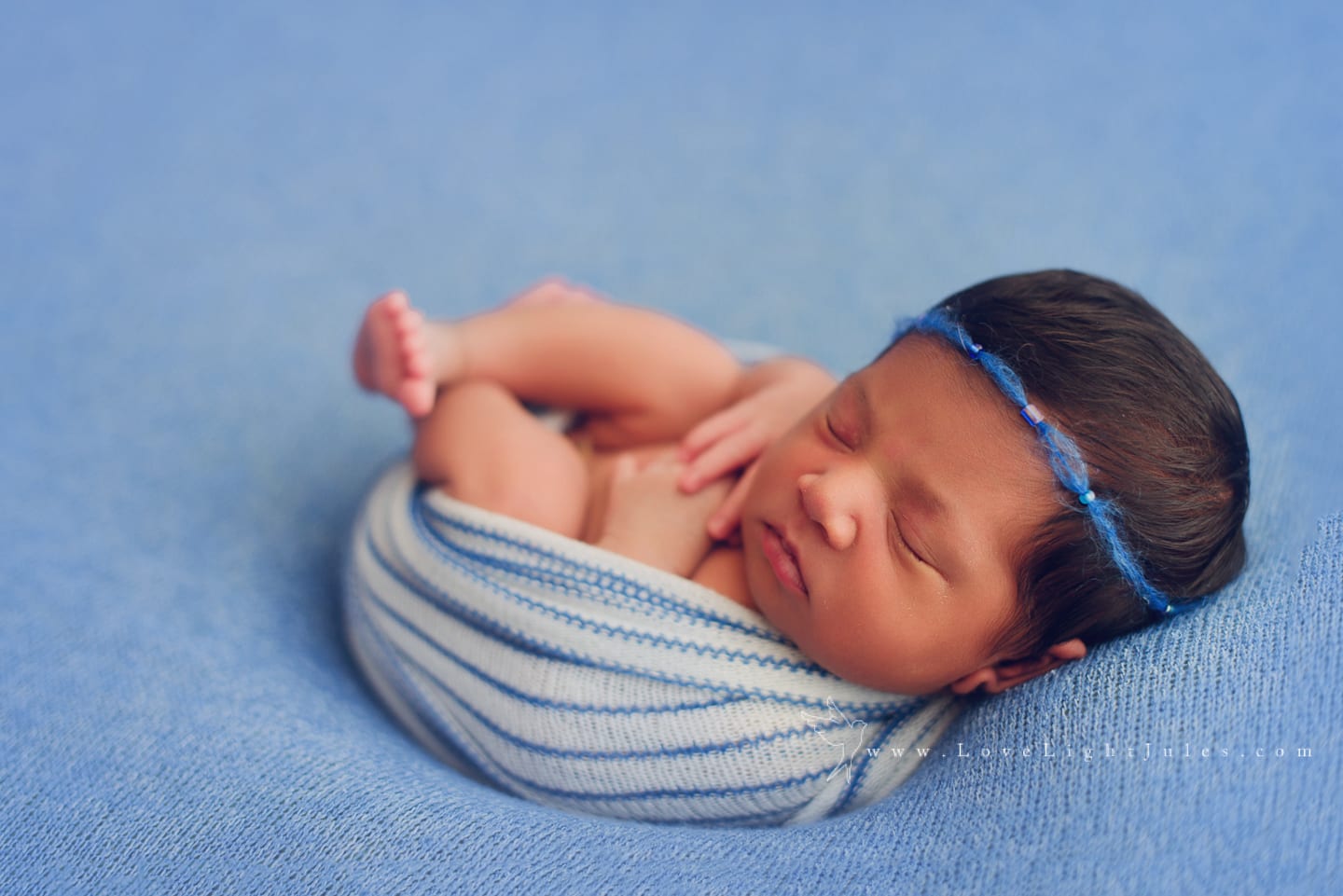 newborn-baby-girl-on-blue-blanket-by-sacramento-photogrpaher
