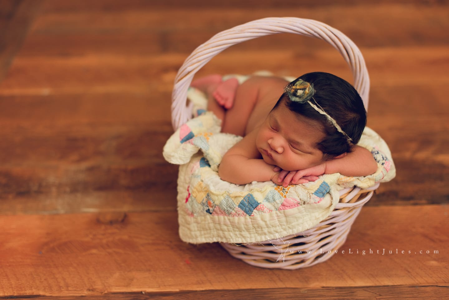 image-of-baby-in-a-basket-with-vintage-basket-by-sacramento-photographer