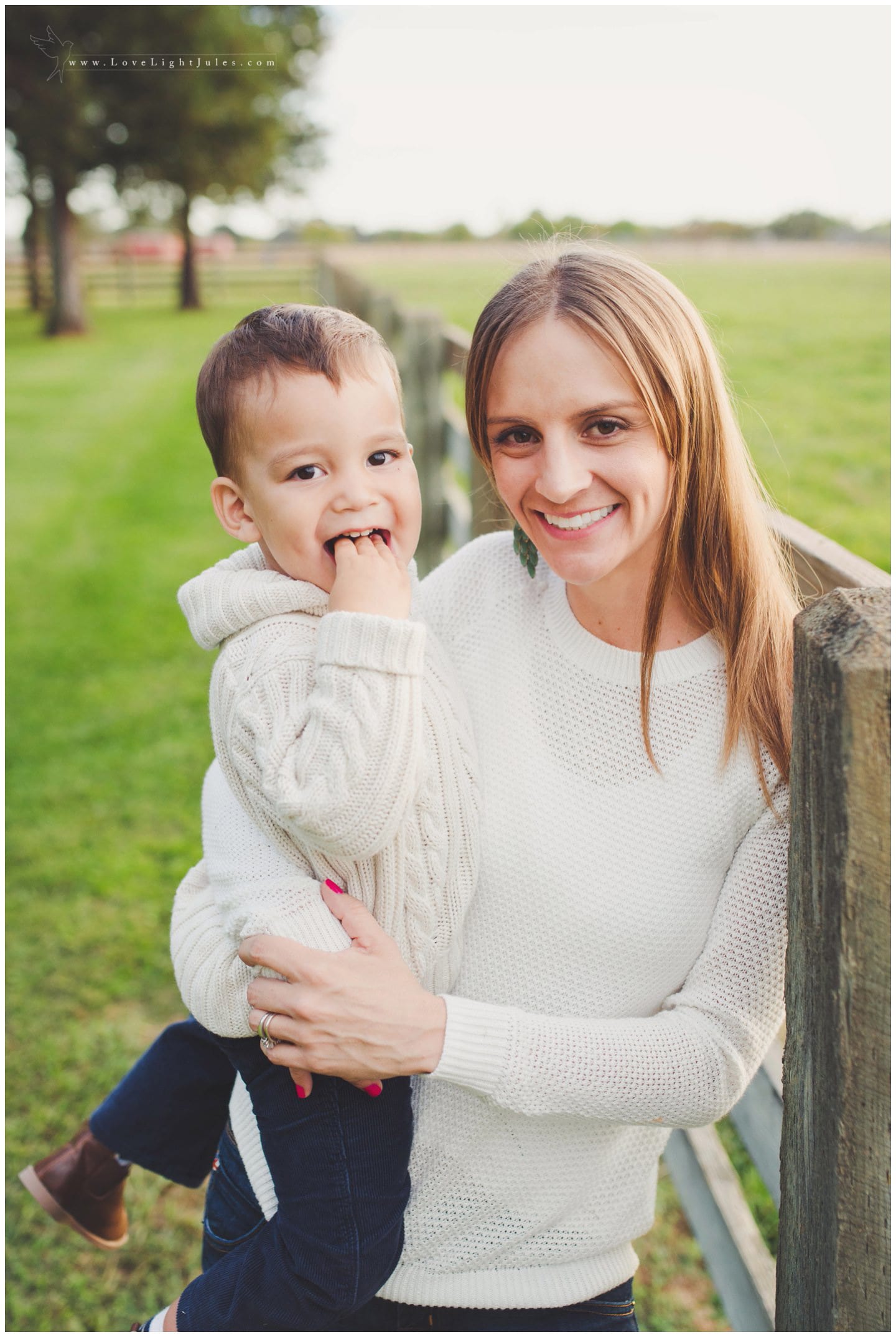 picture-of-mom-and-son-on-barn-fence-in-sacramento