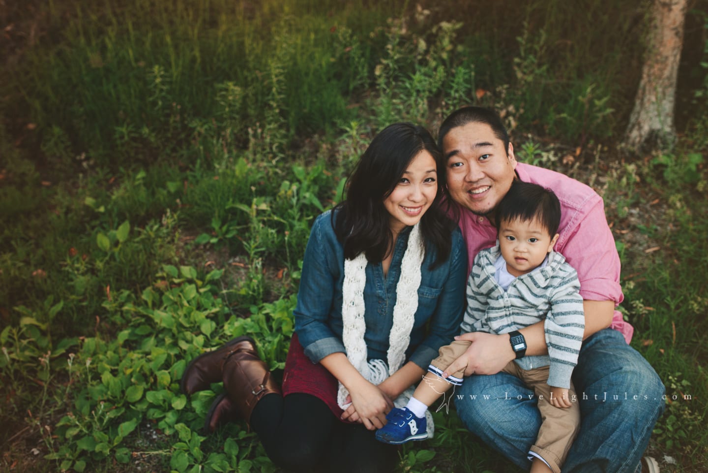 family-sitting-in-grass-by-sacramento-photographer