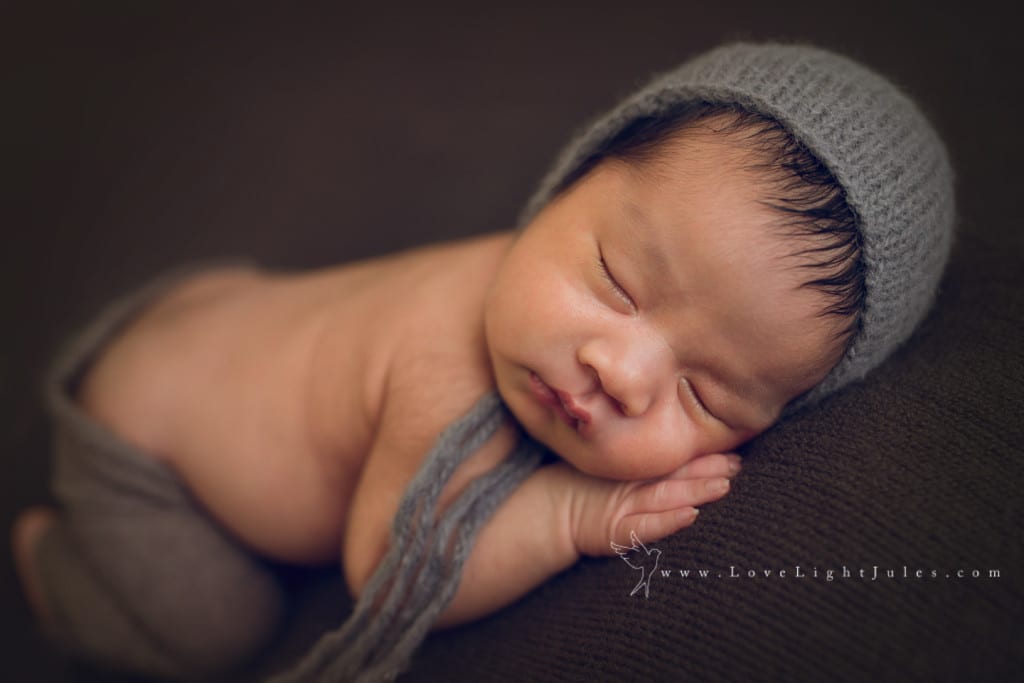 baby-boy-with-bonnet-by-sacramento-newborn-photographer