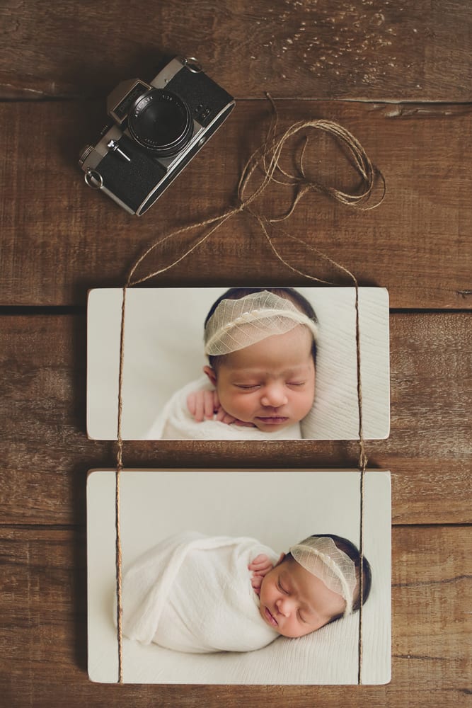 newborn-photo-session-on-hanging-wood-blocks