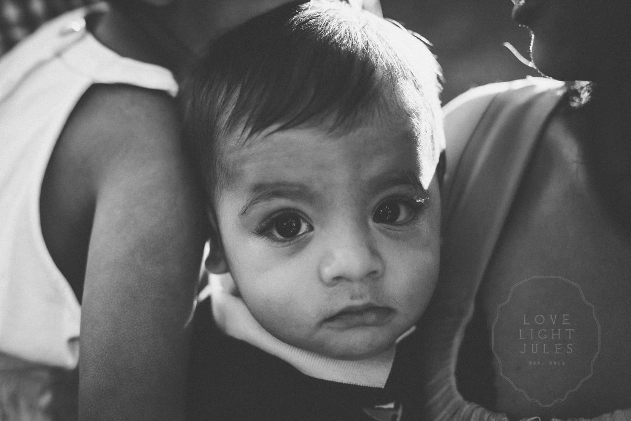 Close-up-portrait-of-baby-in-sacrament-in-black-and-white