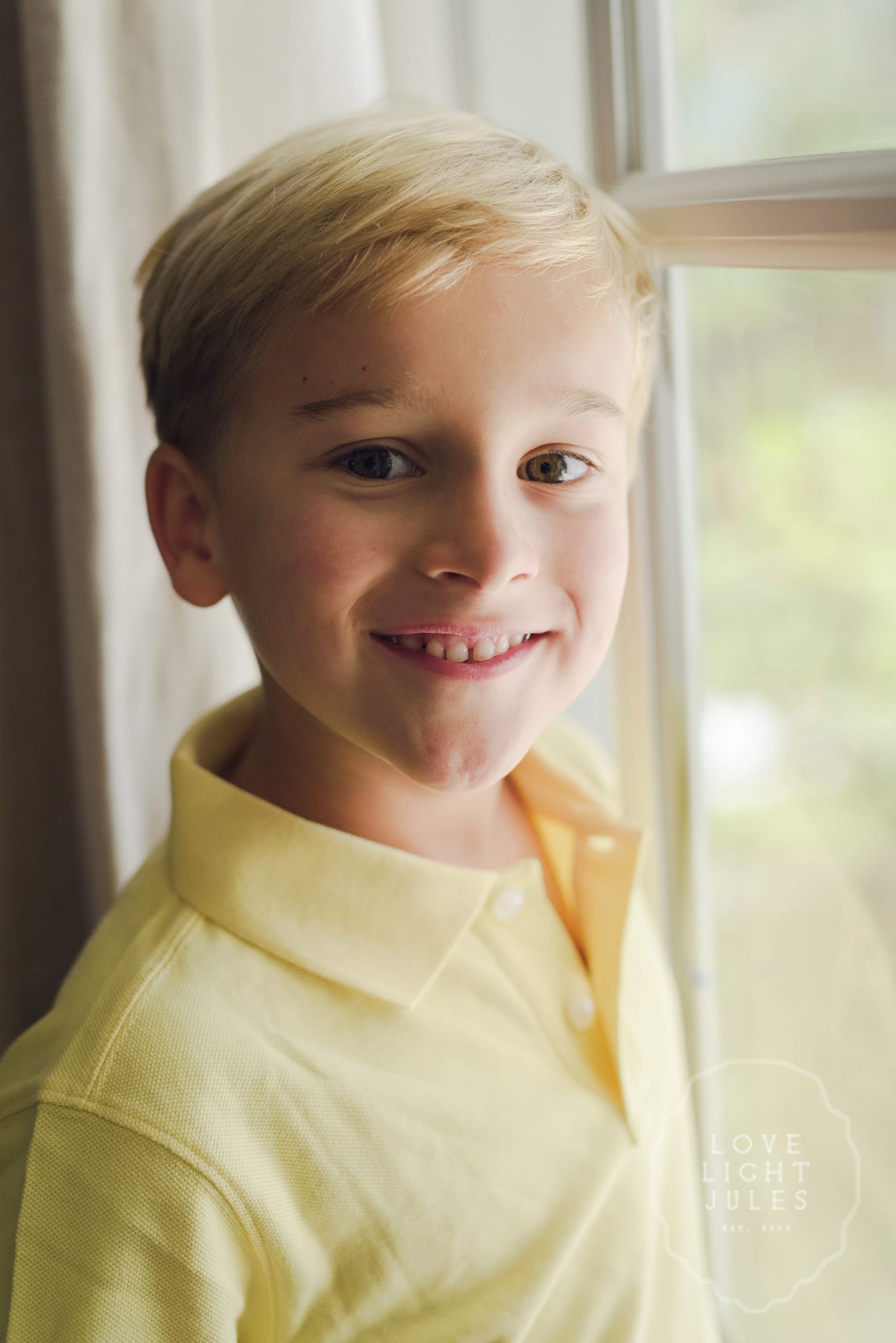 Individual-child-portrait-taken-by-window-by-sacramento-photographer