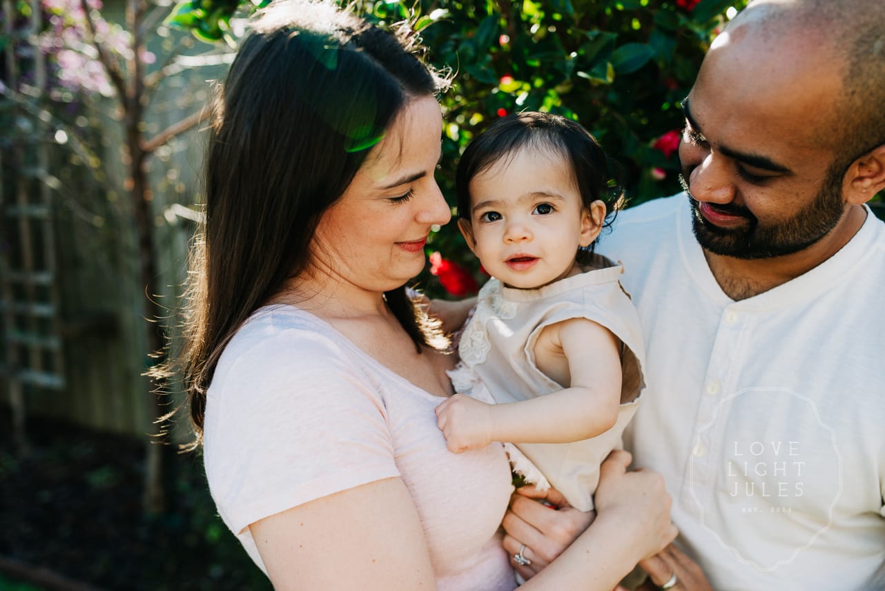 close-up-candid-portrait-with-baby-looking-at-camera-during-sacramento-session