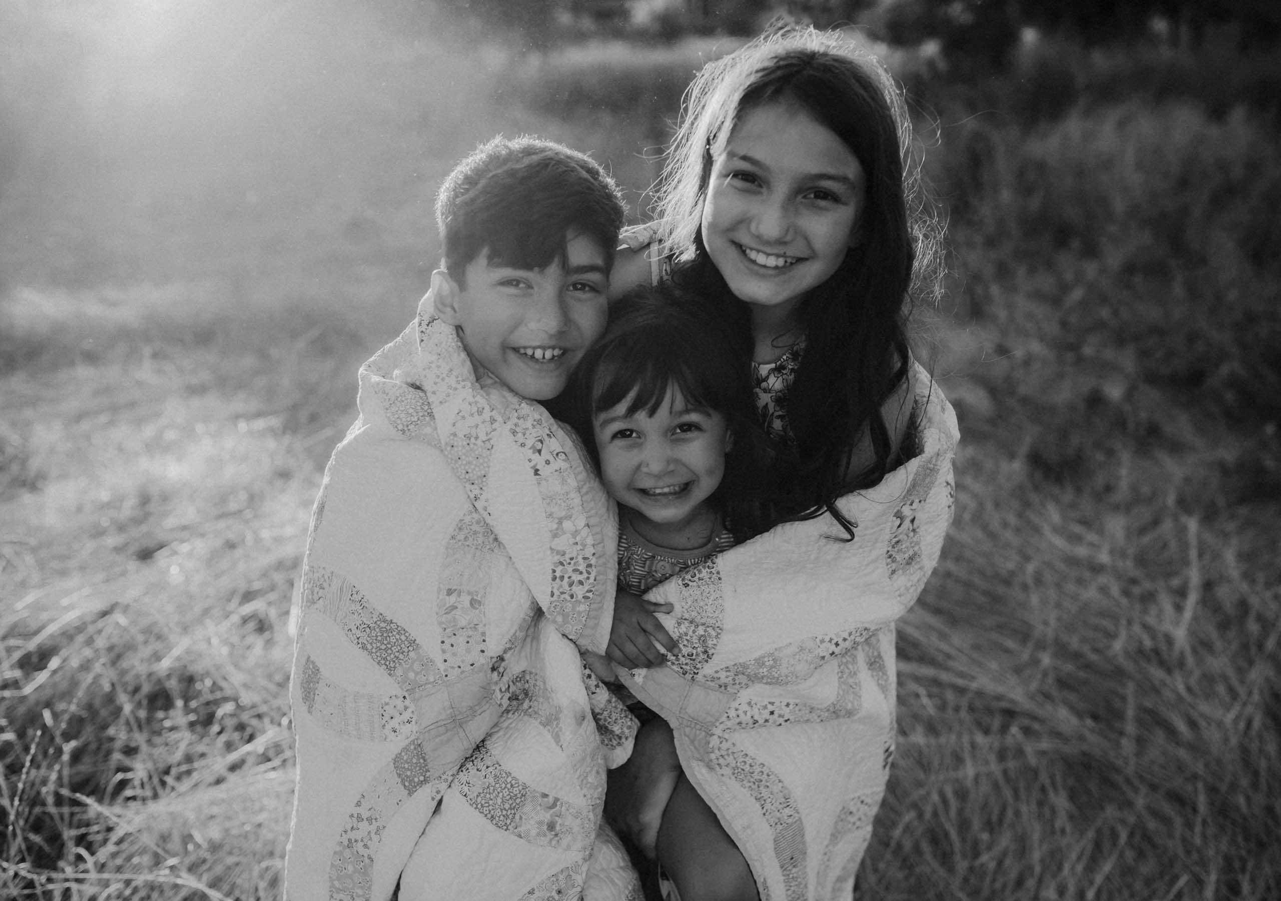 black-and-white-photograph-of-three-kids-at-jack-hill-park
